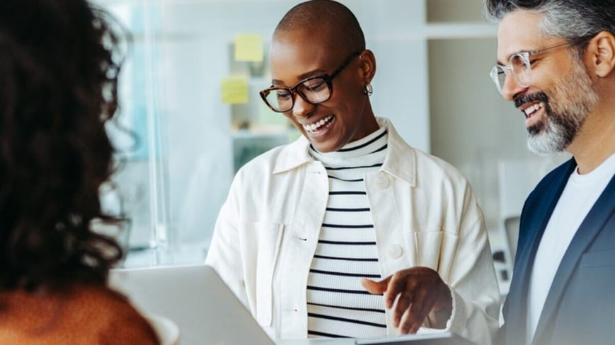 Women completing a HR compliance checklist. 
